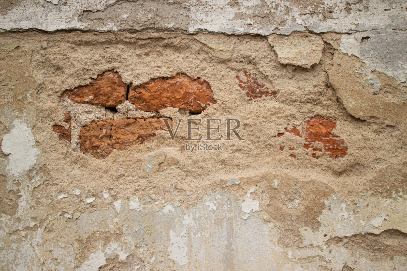 破碎的灰泥墙,亚洲殖民地的灰泥墙,带有少量砖照片摄影图片