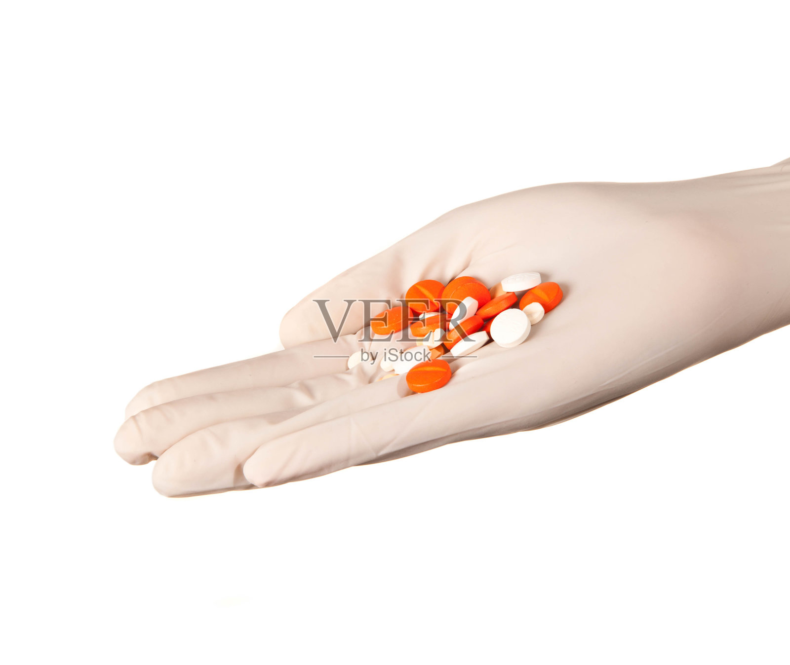 手里拿着药片的男人照片摄影图片