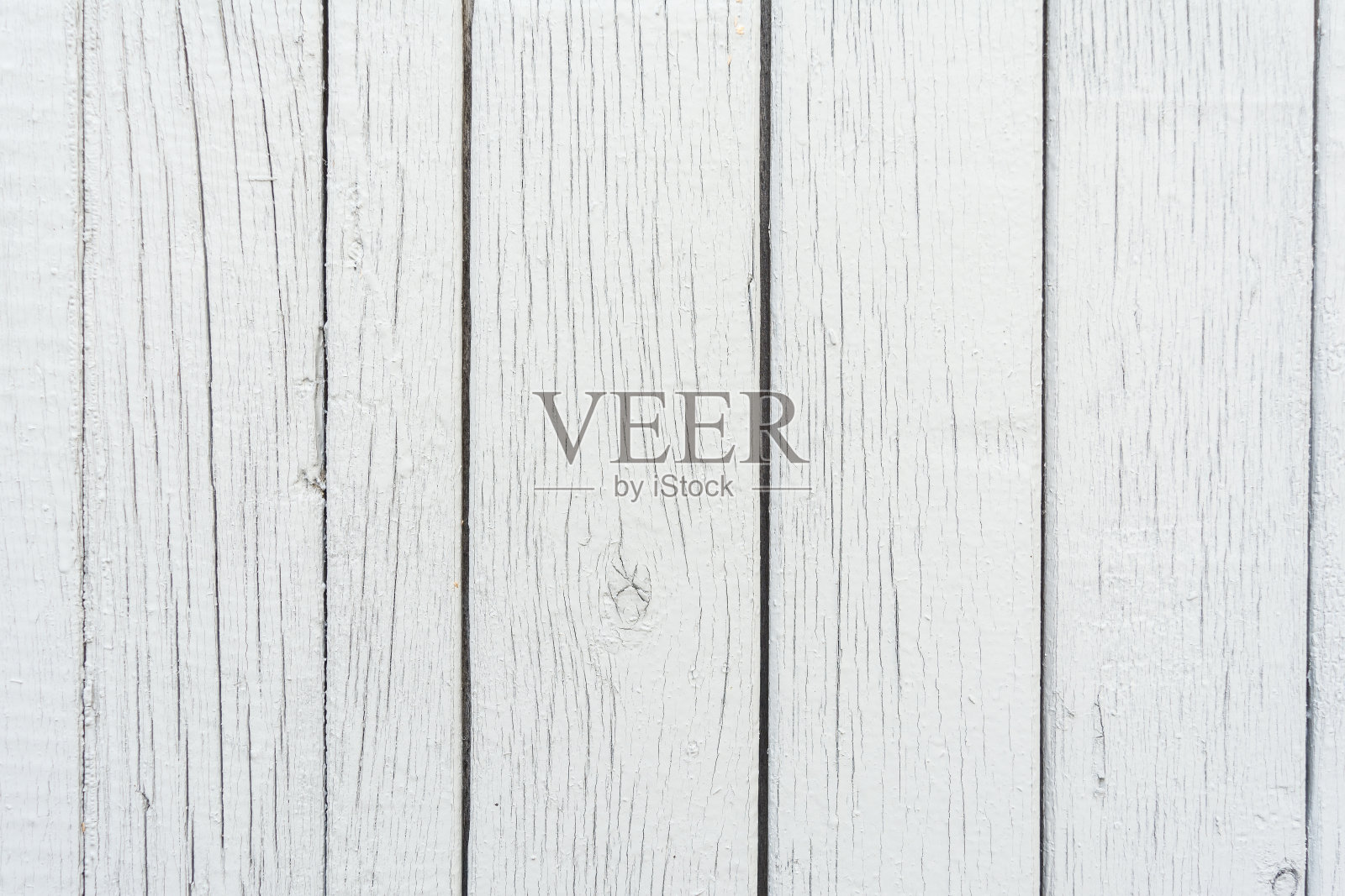 木板呈垂直排列,涂以灰色油漆,可见木纹和小裂缝,背景抽象照片摄影图片