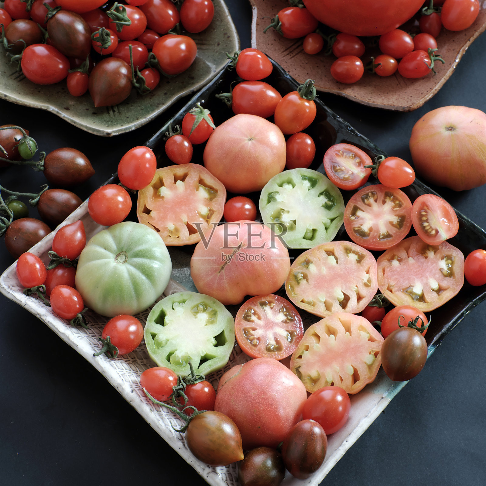 收集西红柿,防癌廉价食品照片摄影图片