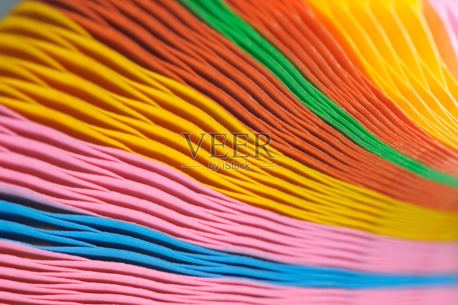 模糊的彩色纸背景。照片摄影图片