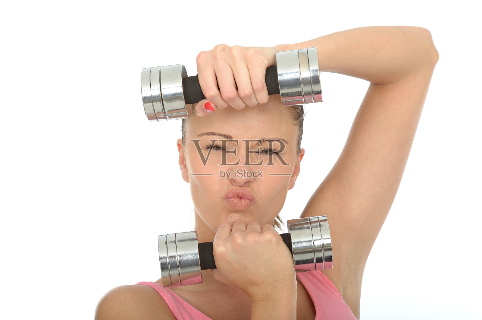 健康年轻女性在举重训练时压力照片摄影图片