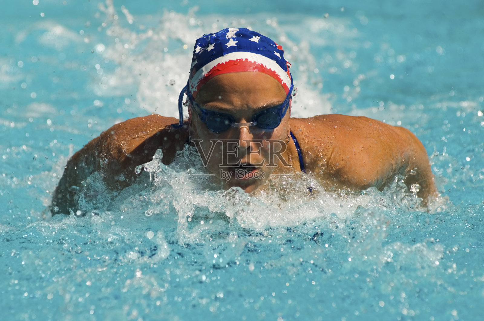 女子游泳蝶泳照片摄影图片