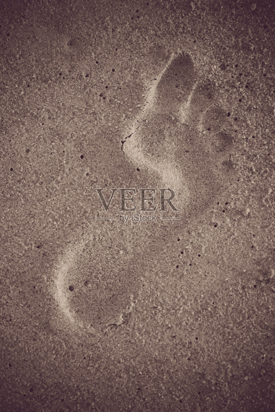 沙地上的一个脚印照片摄影图片