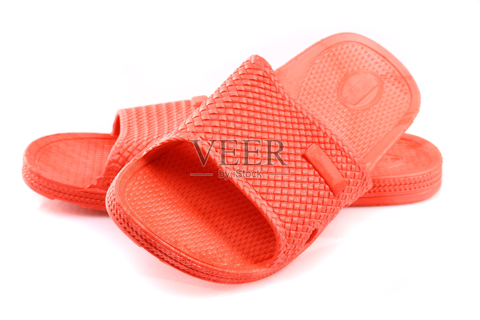 红色的塑料拖鞋照片摄影图片