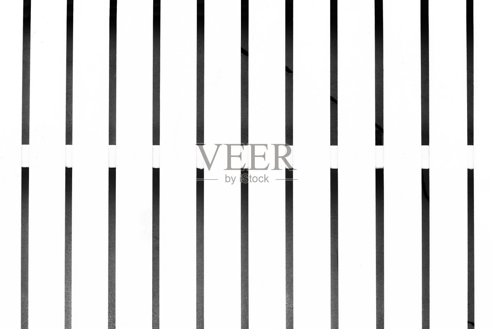 木栅栏纹理背景在黑白场景。照片摄影图片