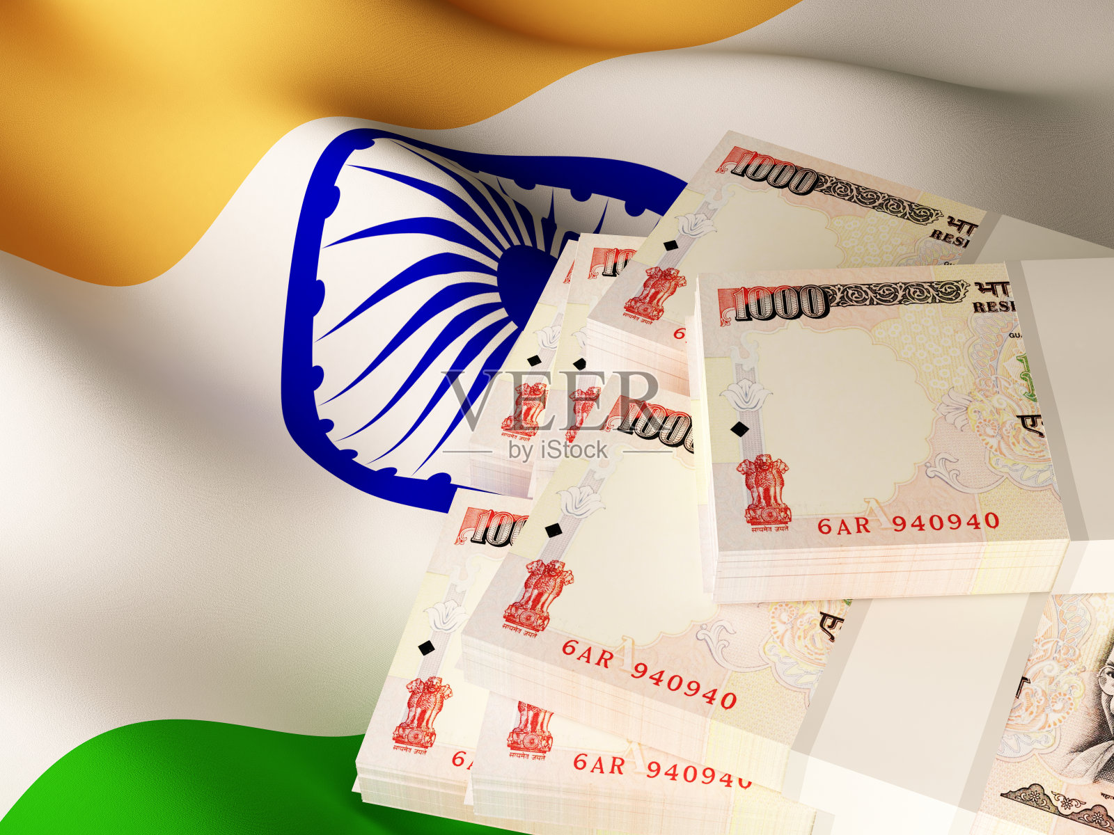 印度国旗上的印度卢比纸币照片摄影图片