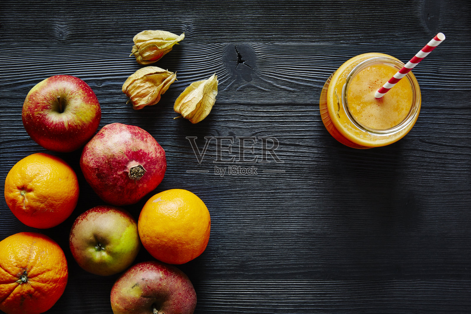 苹果橙石榴健康有机果汁照片摄影图片