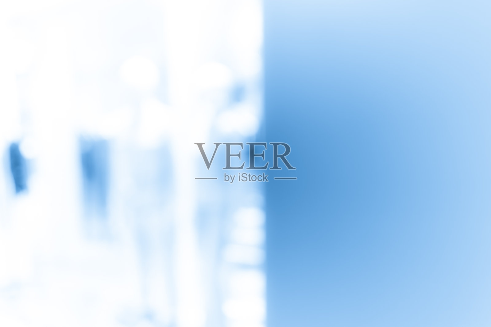 以蓝色为背景,抽象模糊购物中心的室内和零售商店照片摄影图片