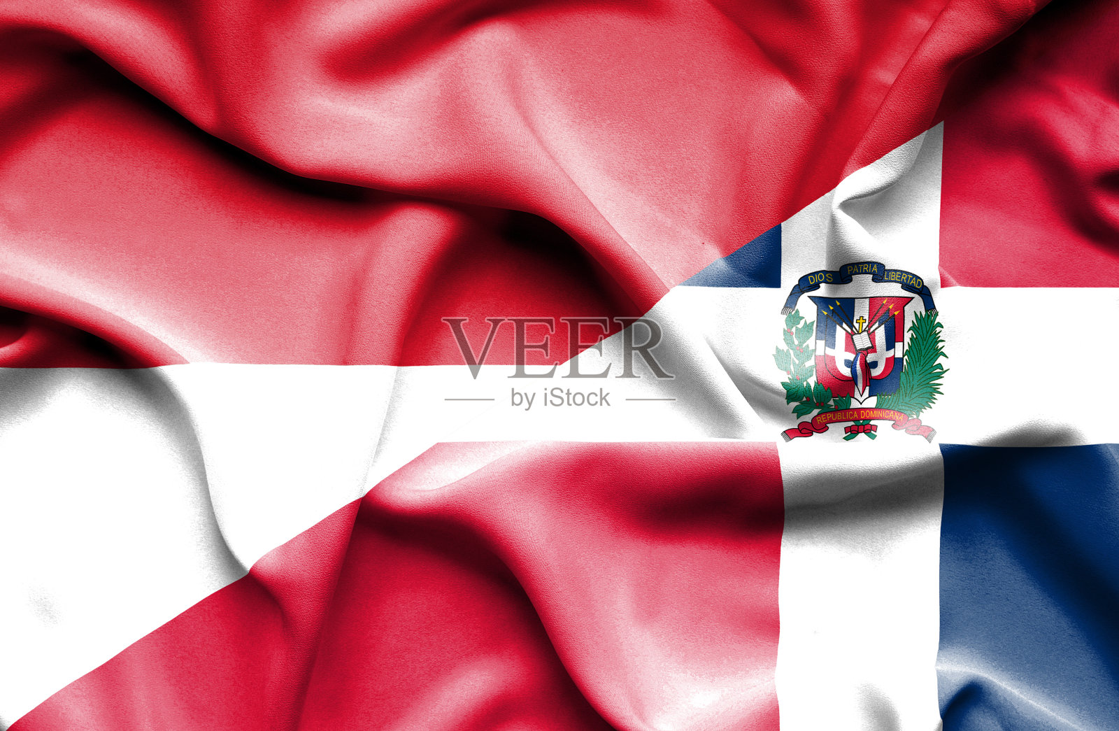 挥舞着多米尼加共和国和印度尼西亚的旗帜照片摄影图片