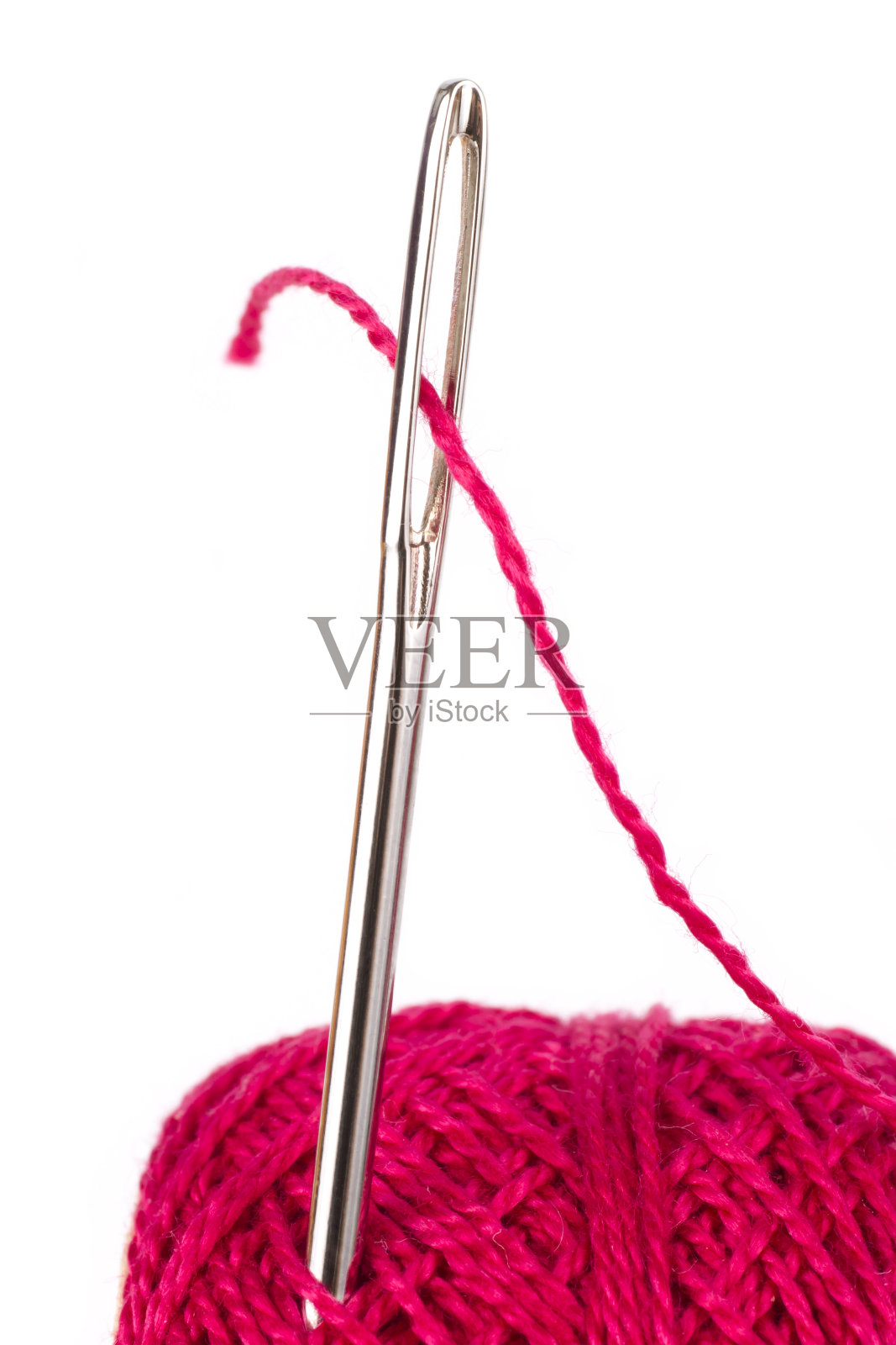 缝线穿过针眼照片摄影图片