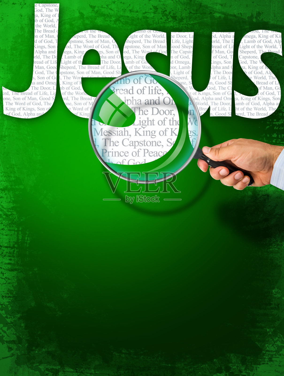 用放大镜观察耶稣的名字照片摄影图片