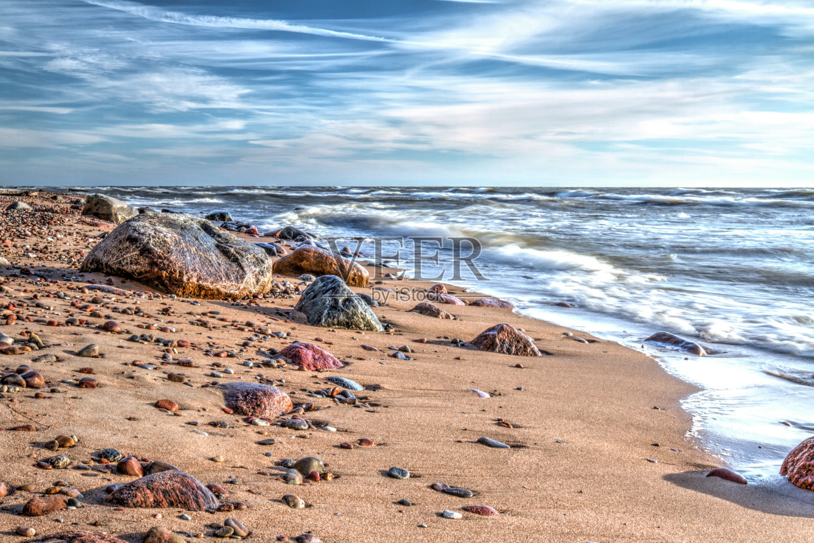 用石头打死海岸照片摄影图片