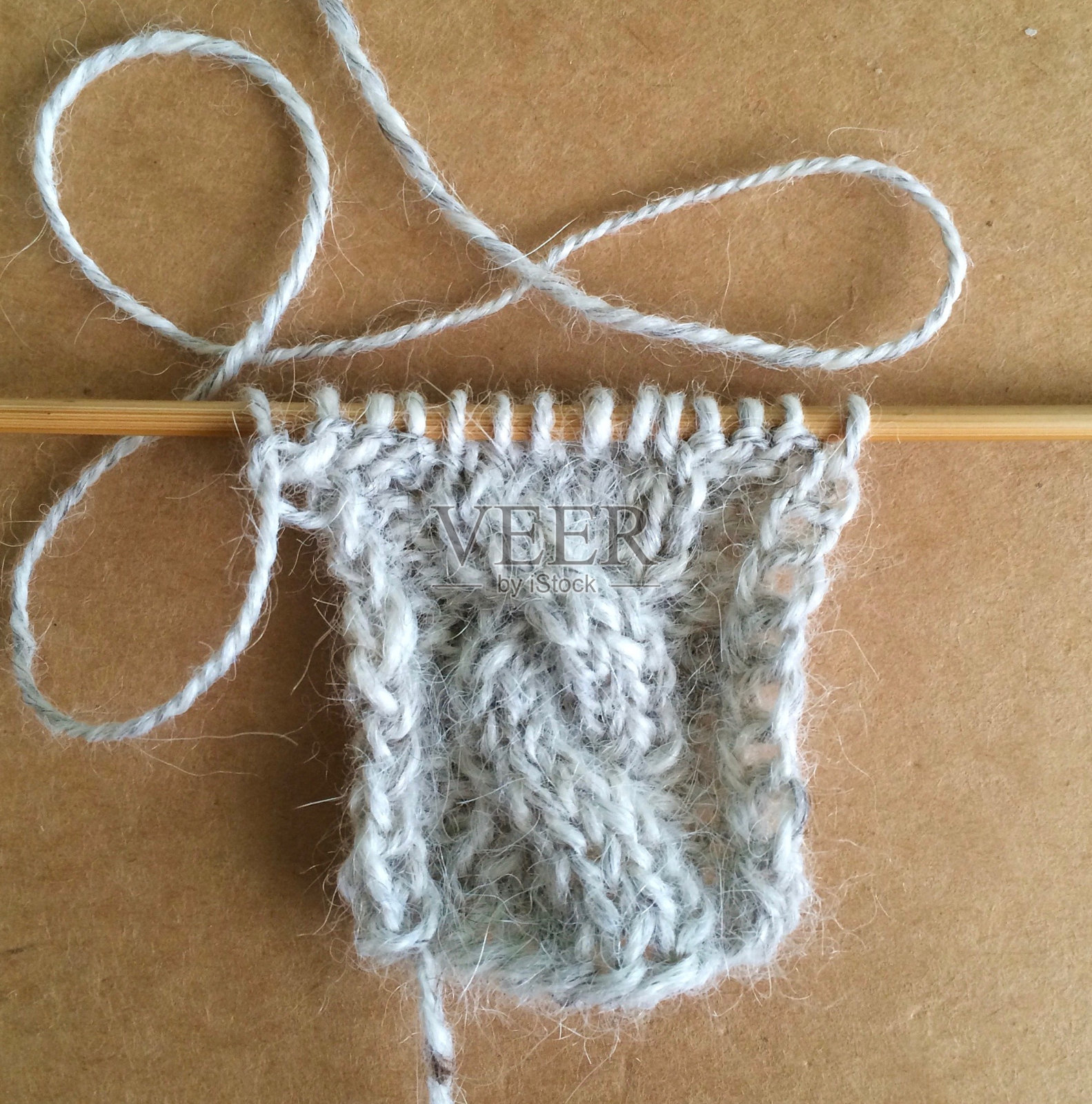 针织针上的针织样品照片摄影图片