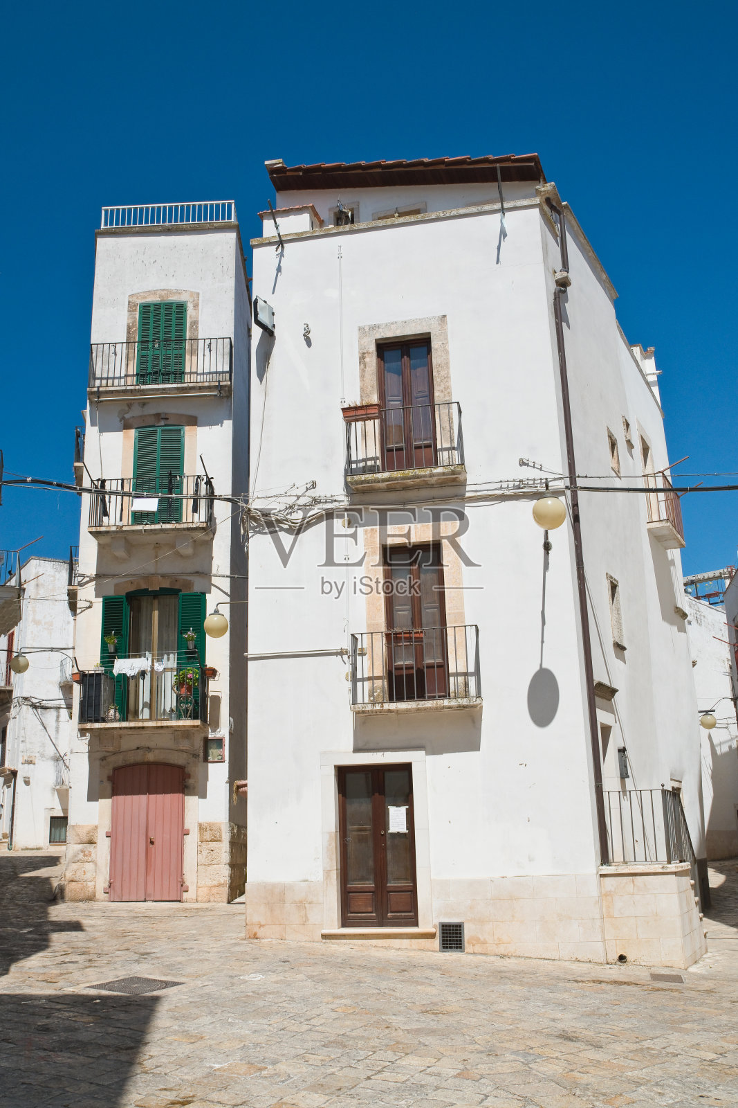 小巷。Putignano。普利亚区。意大利。照片摄影图片