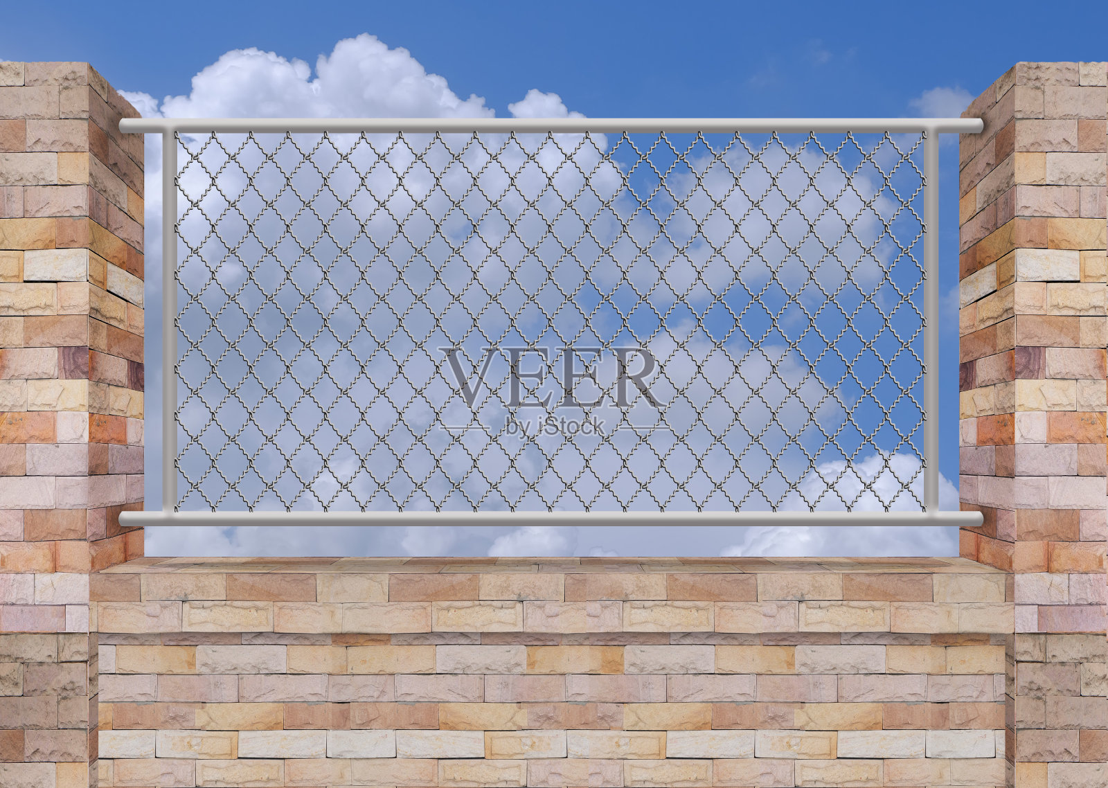 上面有砖墙和铁栅栏照片摄影图片