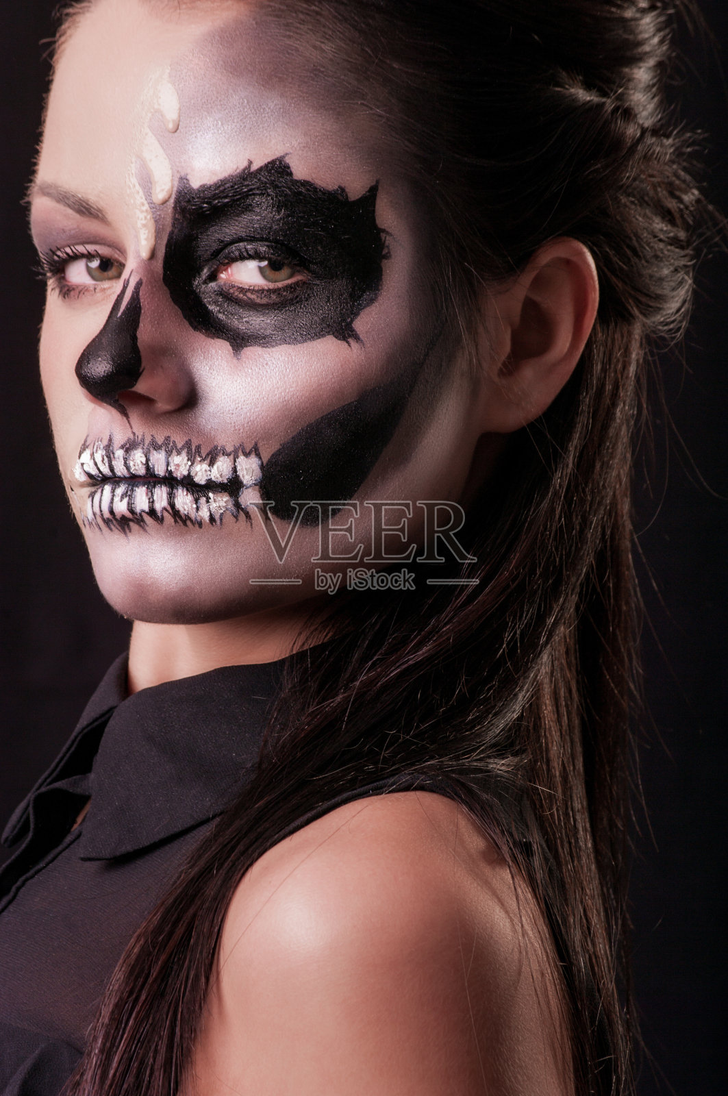 化妆骷髅的漂亮女人照片摄影图片