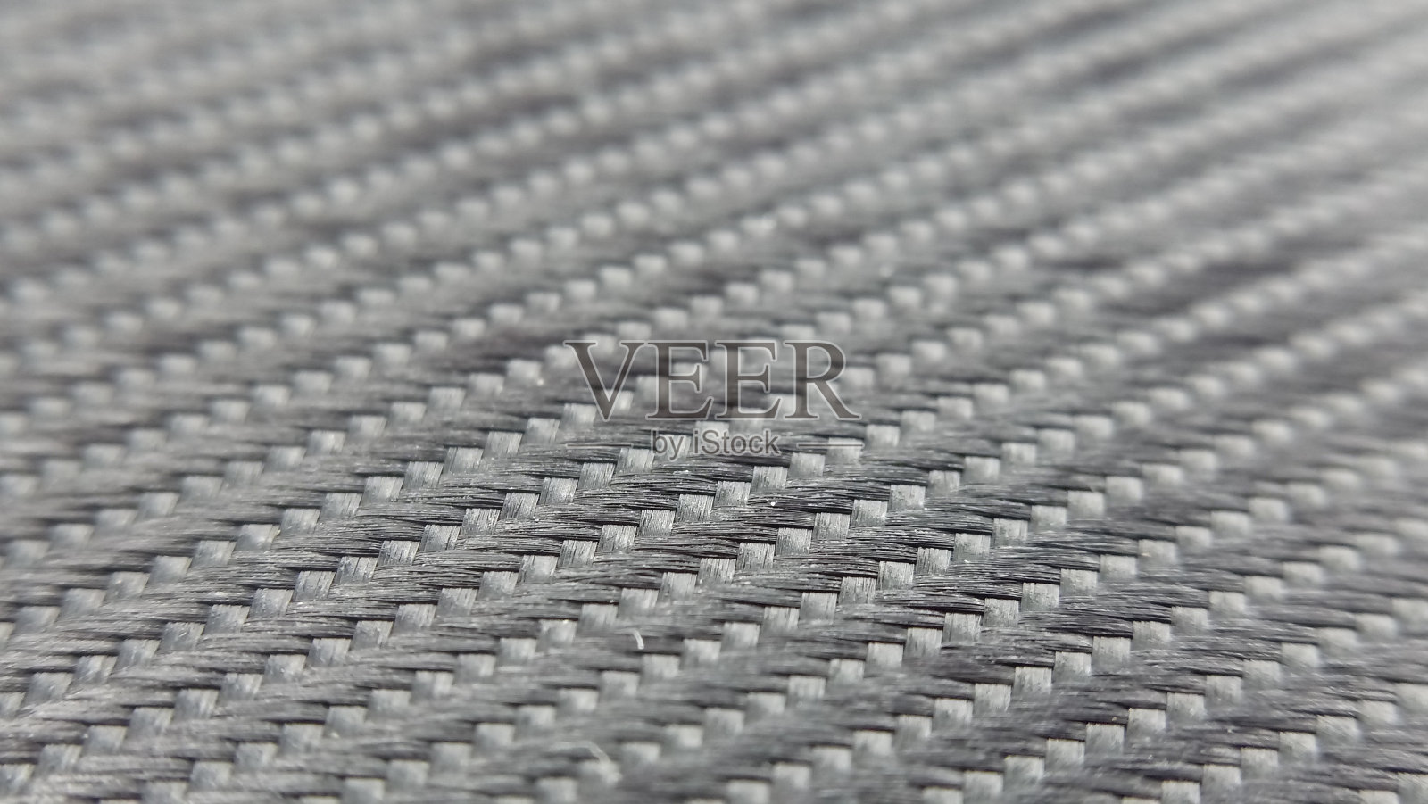 黑色织物的特写。照片摄影图片