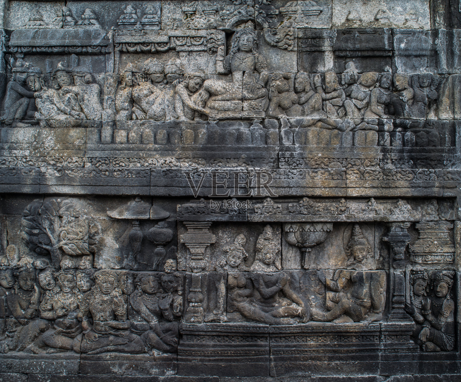 婆罗浮屠寺庙浮雕,位于印度尼西亚中爪哇马格朗婆罗浮屠寺庙照片摄影图片