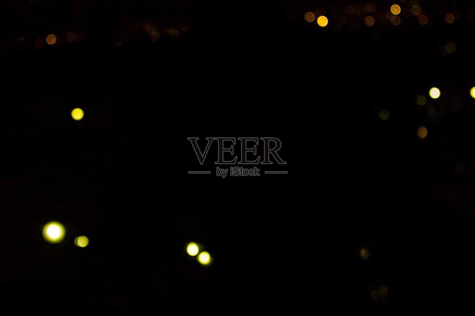 模糊灯光在黑色背景照片摄影图片