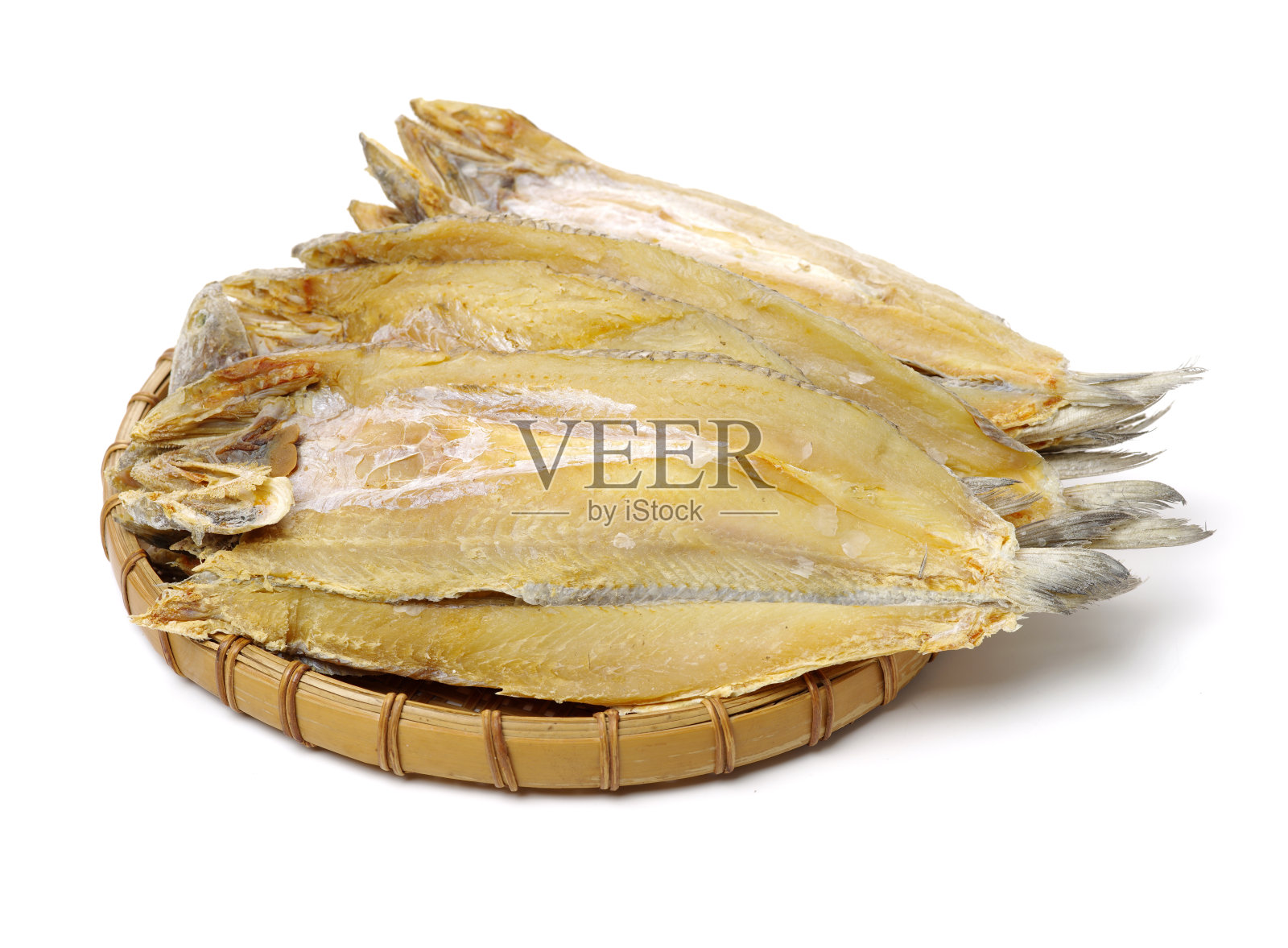 干咸鱼在白色的背景照片摄影图片