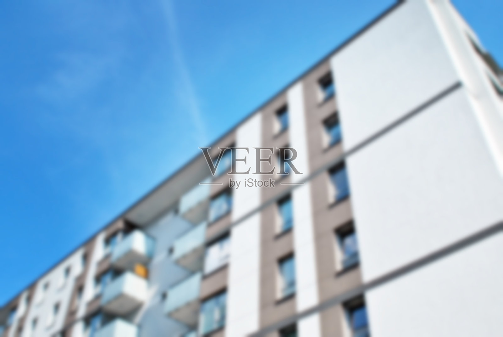 抽象模糊的现代公寓建筑。照片摄影图片