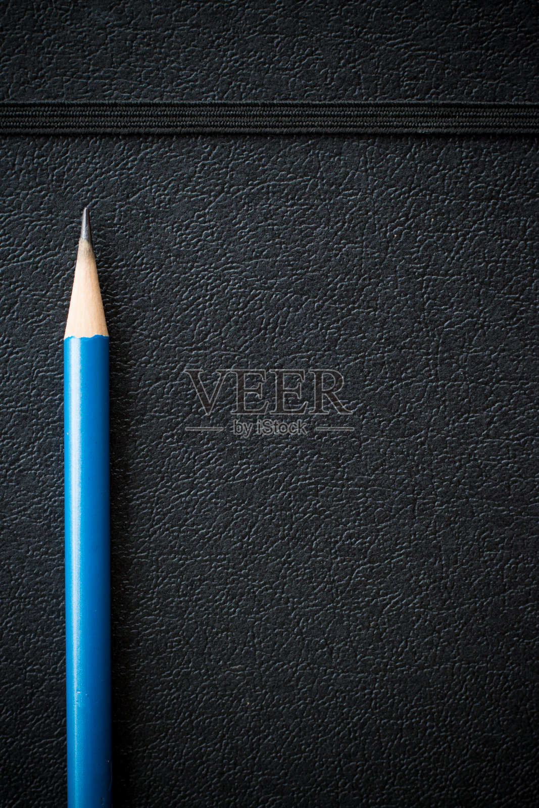 黑色皮革笔记本照片摄影图片