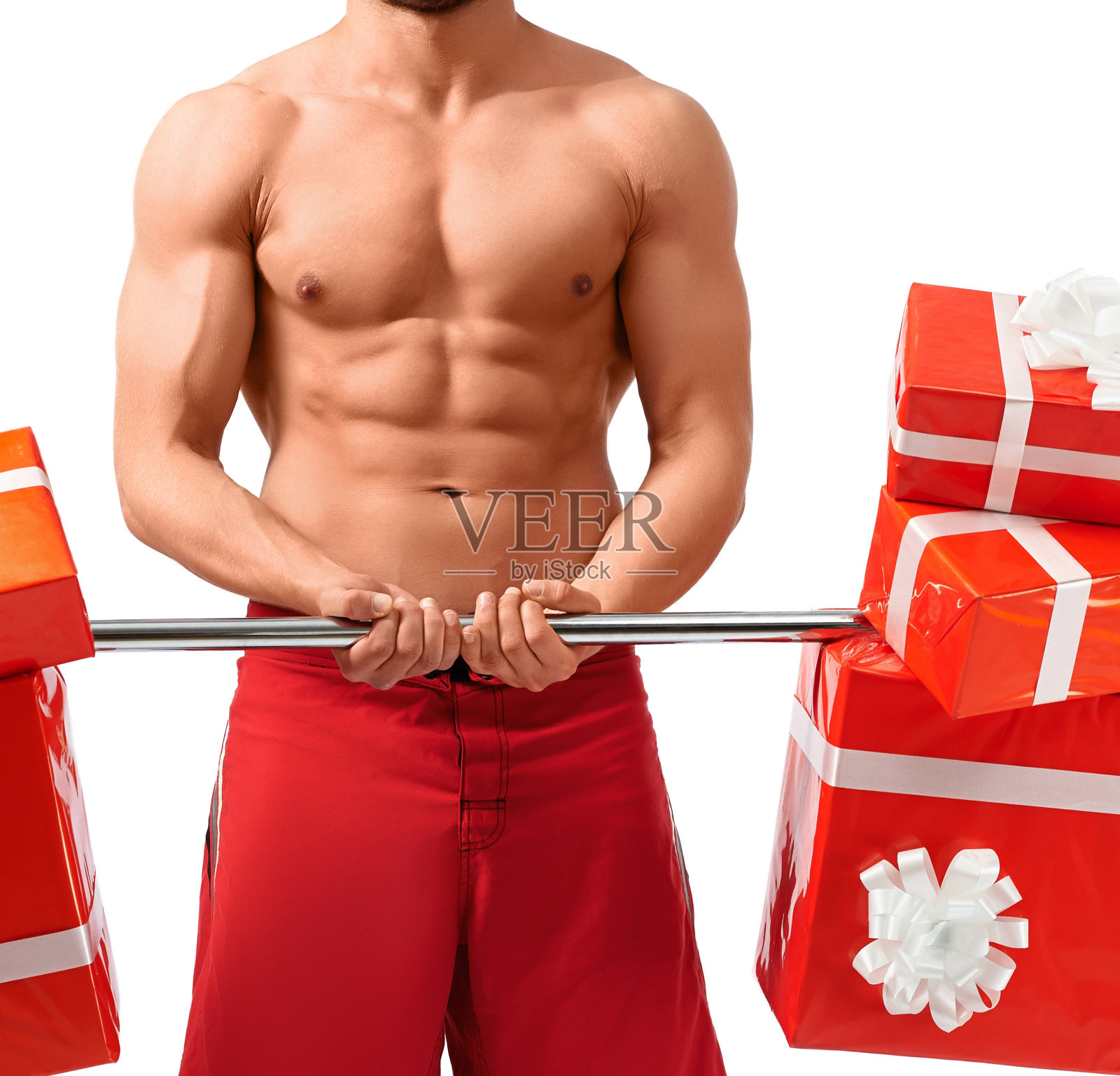 带着杠铃的性感圣诞老人照片摄影图片