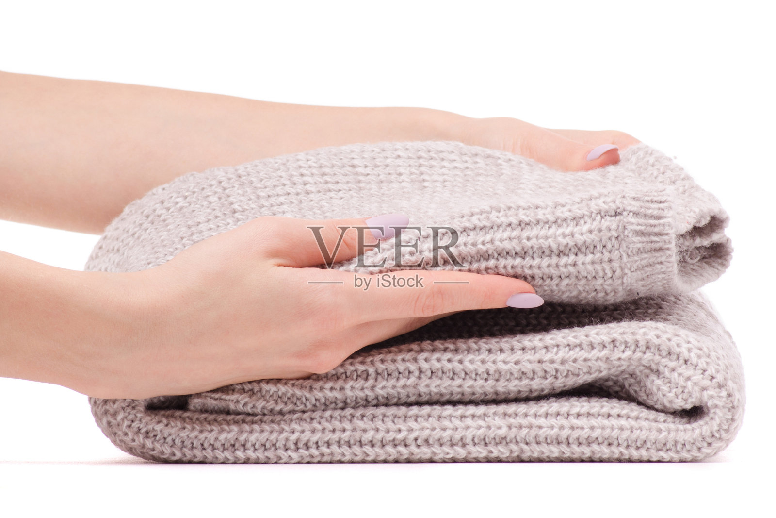 暖毛衣米色折叠女性手照片摄影图片