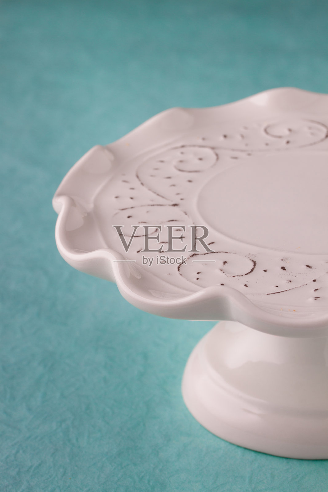 蛋糕站在绿松石背景照片摄影图片