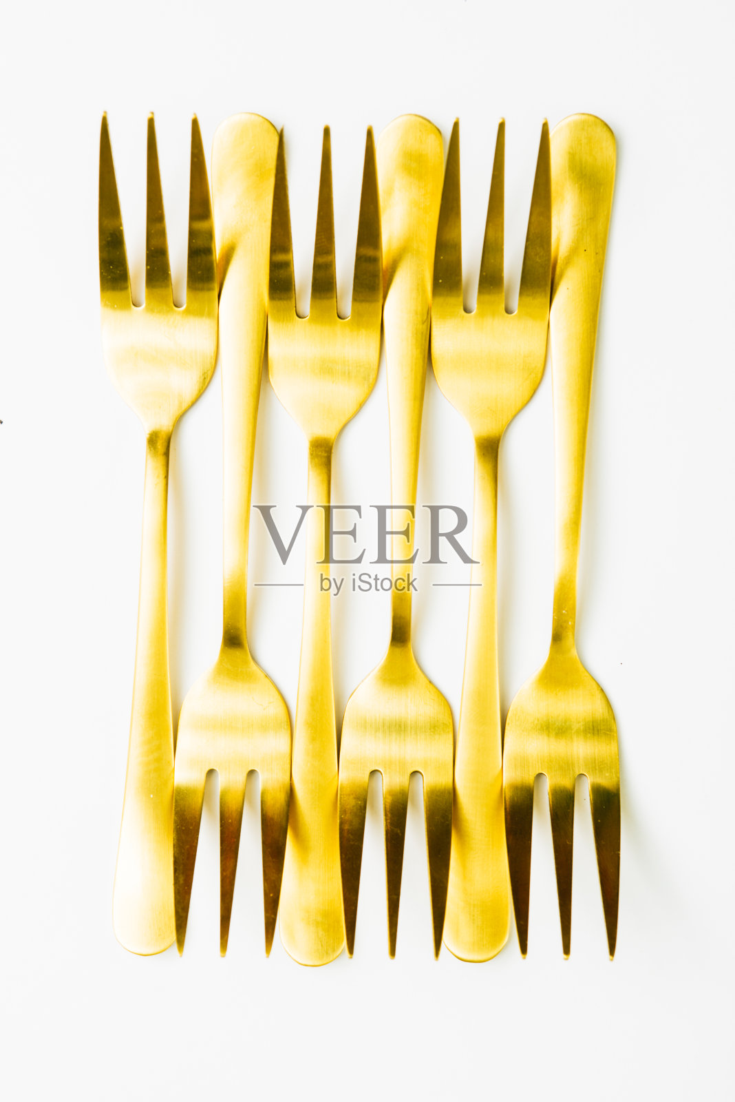金色的小餐叉照片摄影图片
