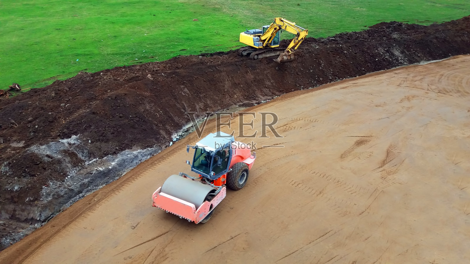 压实机和挖掘机照片摄影图片