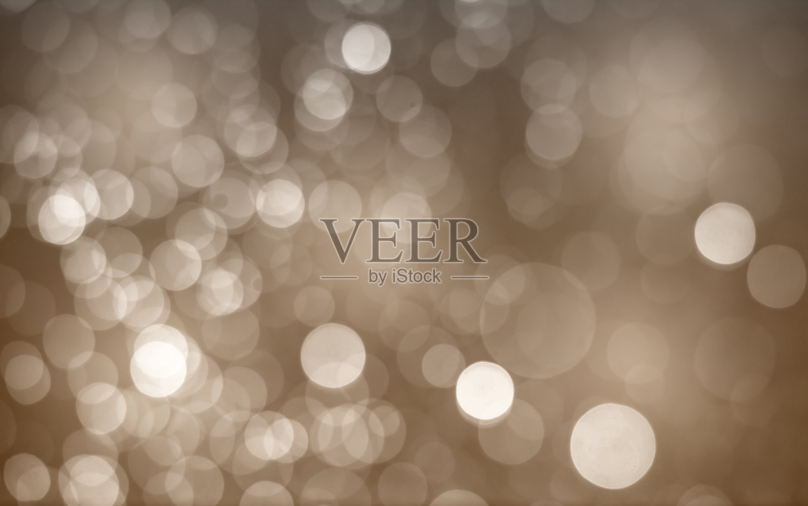 棕色散景抽象背景。照片摄影图片