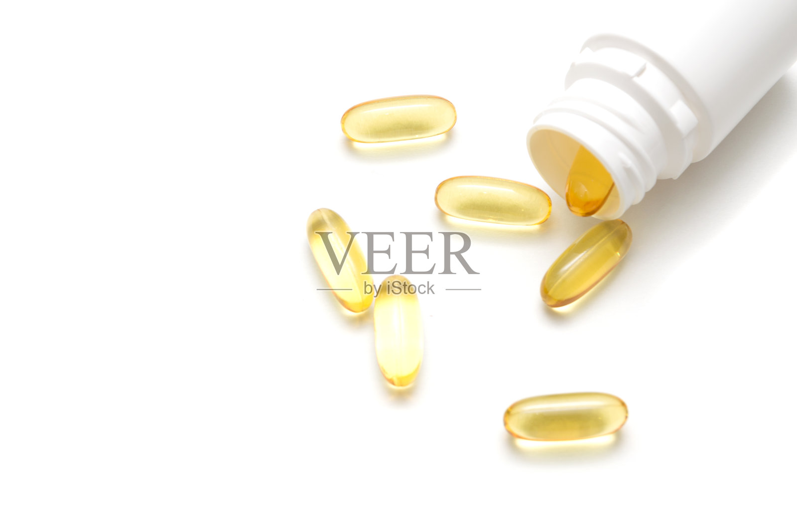 白色背景上的药丸和药瓶:医学概念照片摄影图片