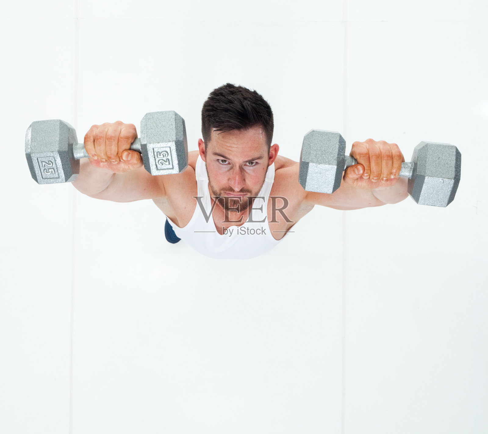 用哑铃的运动员照片摄影图片