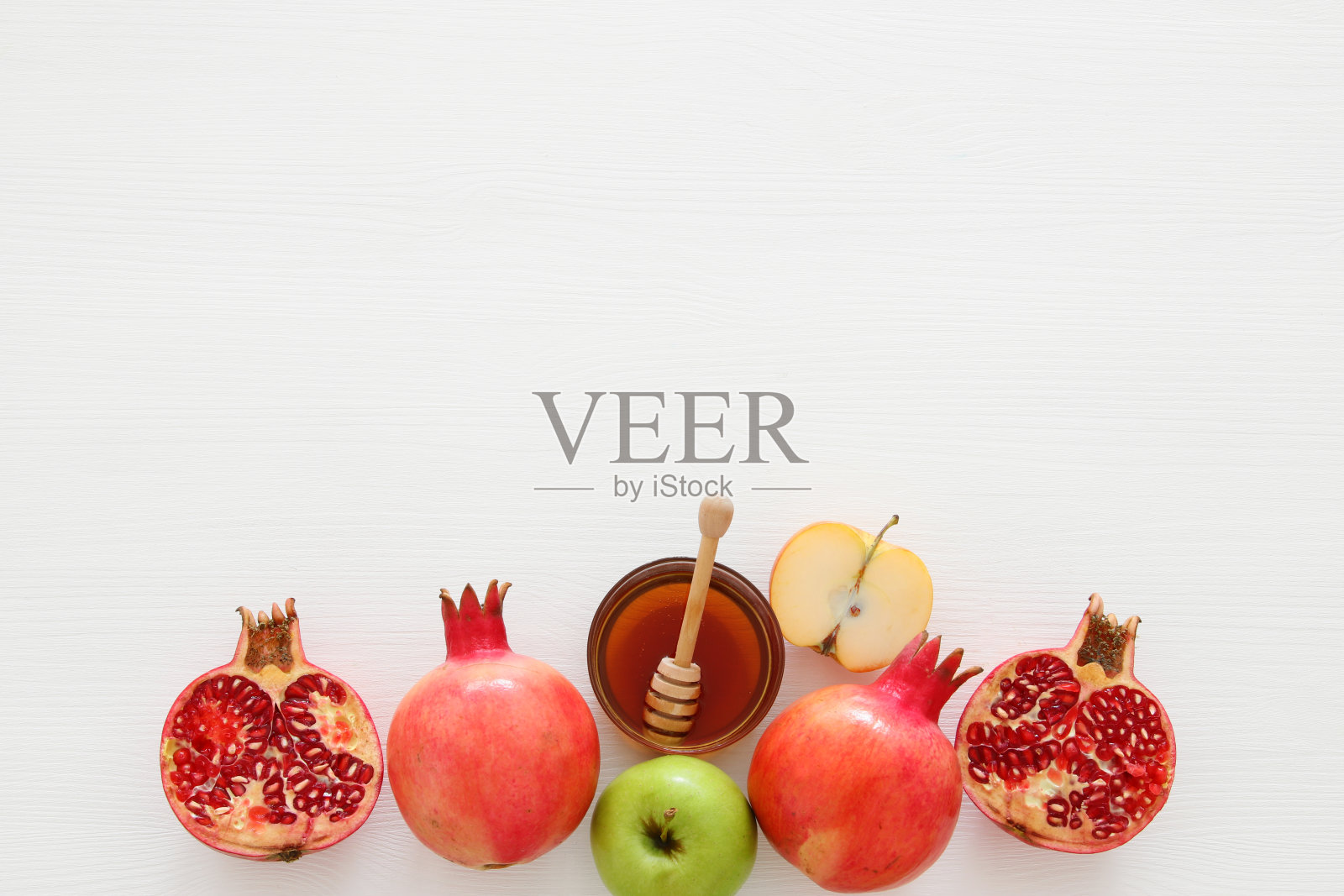 犹太新年的概念。传统符号。照片摄影图片