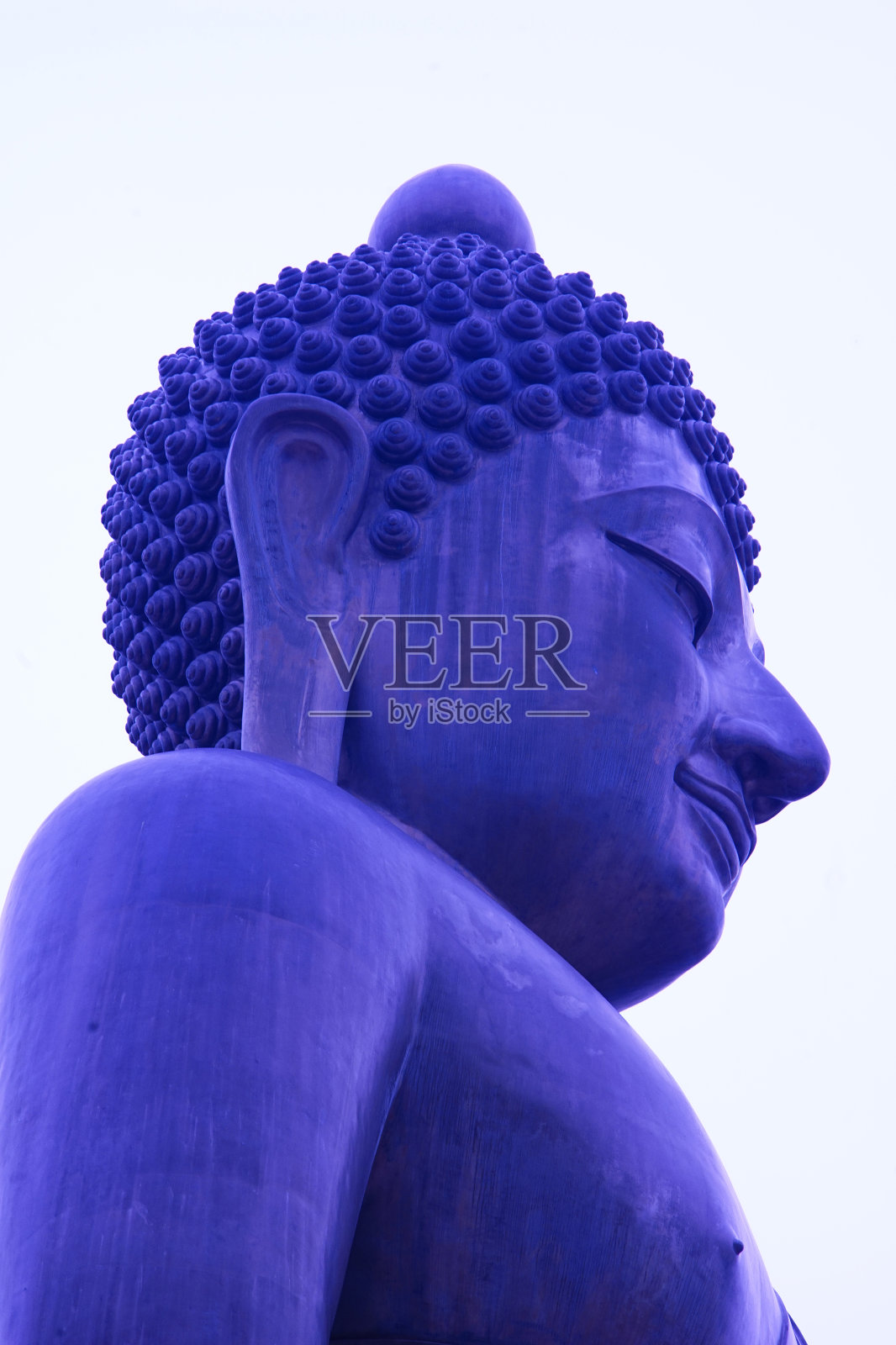 侧面的佛像脸。照片摄影图片