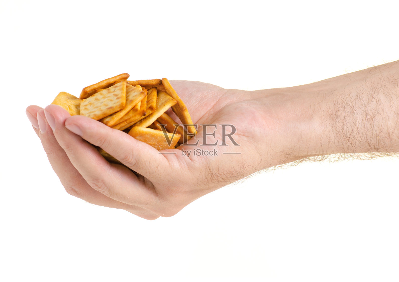 手里拿着饼干照片摄影图片