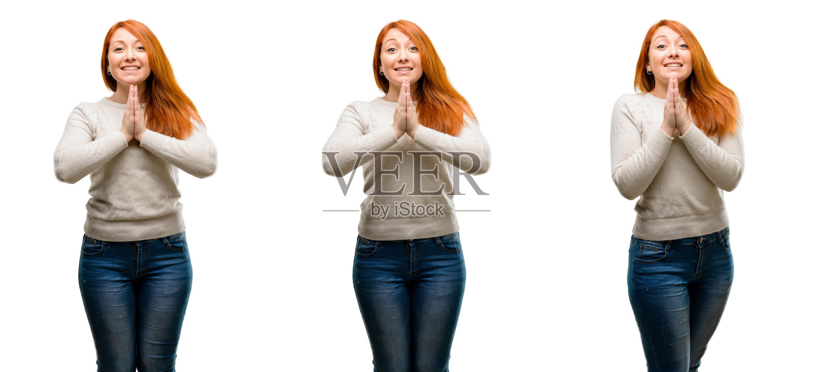 年轻美丽的红发女子双手合十,以祈祷的姿势,表达希望和请的概念照片摄影图片