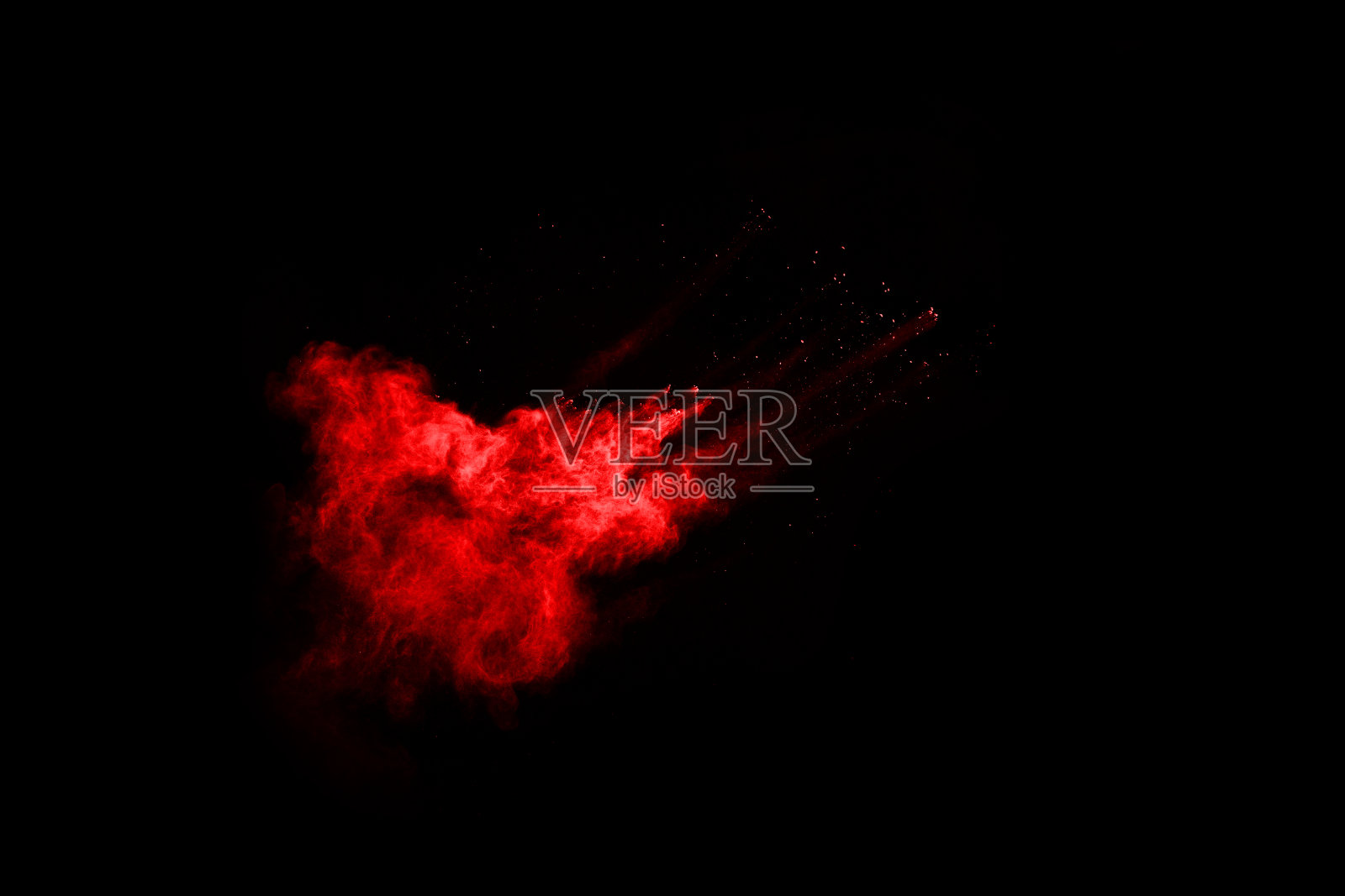 摘要红色粉末在黑色背景上爆炸。抽象的红色粉末溅在黑色背景上。冻结运动的红色粉末爆炸。照片摄影图片