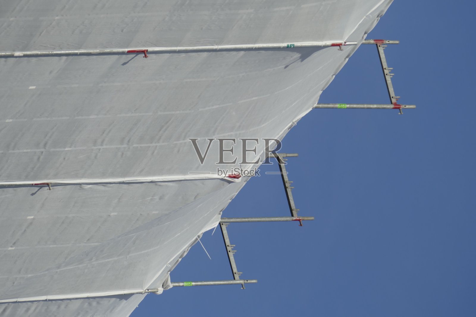 盖下平台,建筑,脚手架,房子的表面照片摄影图片