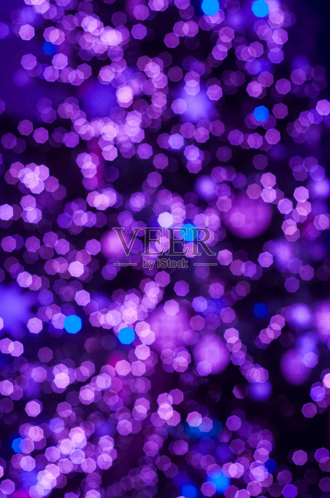 节日闪烁散焦紫色背景与散焦灯光照片摄影图片