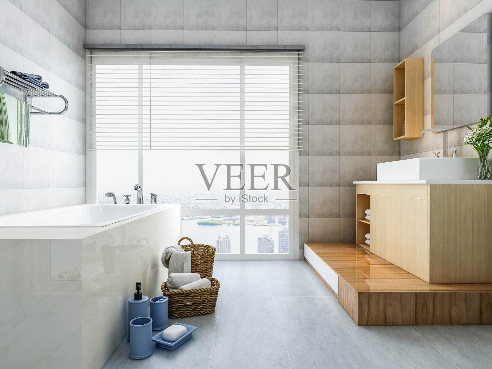 现代和宽敞的浴室设计,浴缸,梳妆台和洗衣机,以及绿色植物,阳光透过巨大的落地窗照片摄影图片