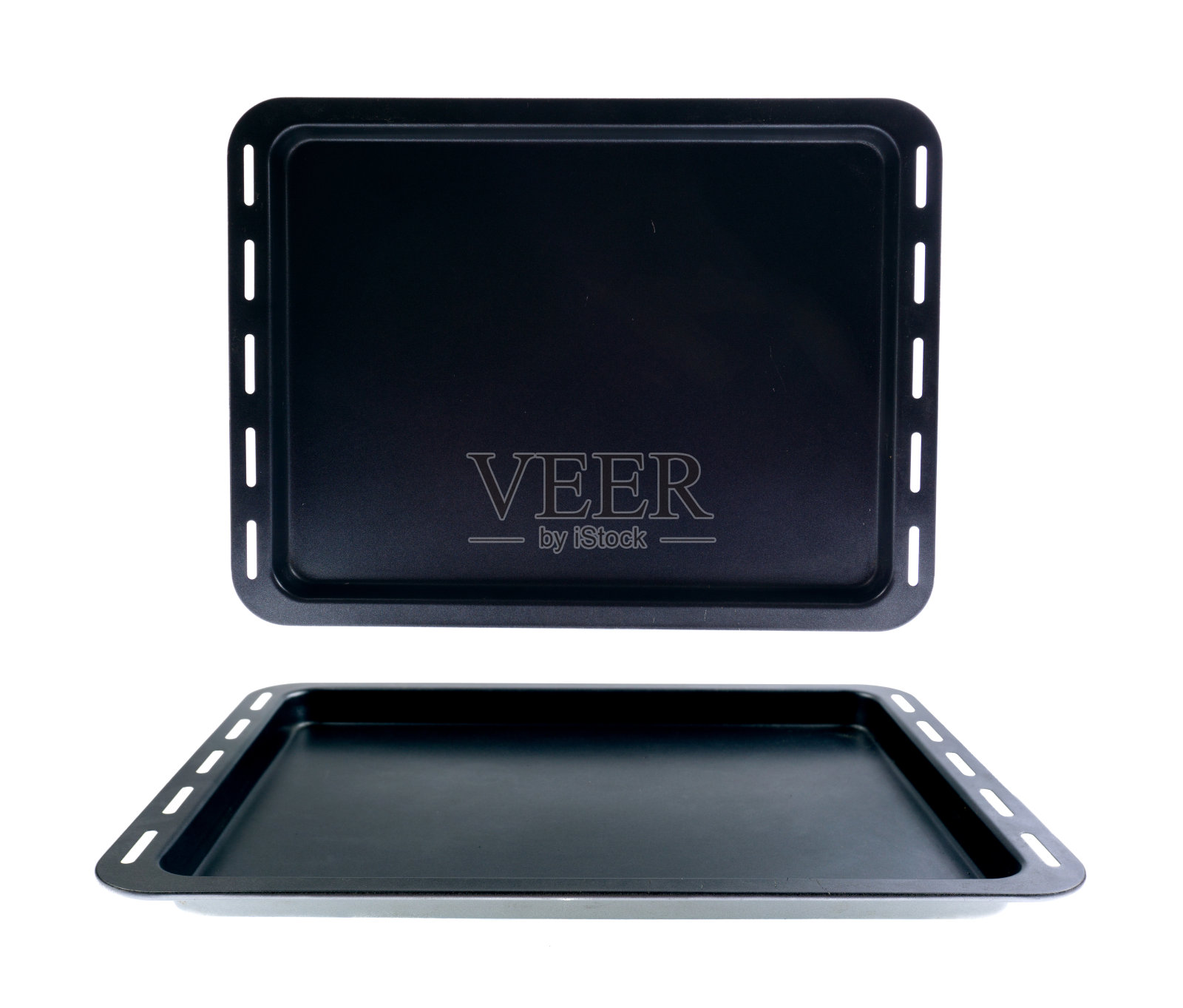 制作蛋糕、面包和松饼的不同类型的烤盘和模具。照片摄影图片