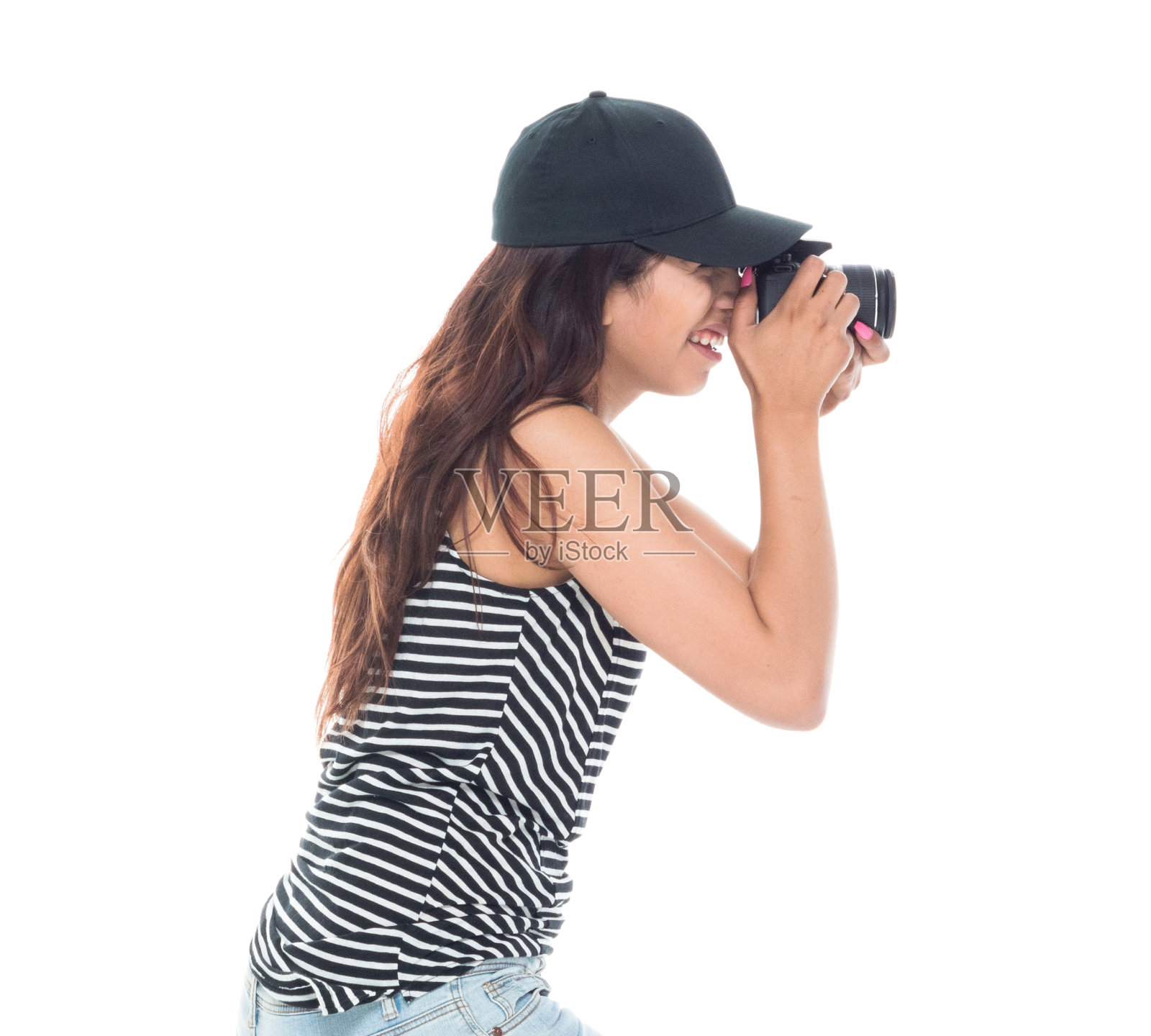 年轻美丽的拉丁美洲女人拿着相机照片摄影图片