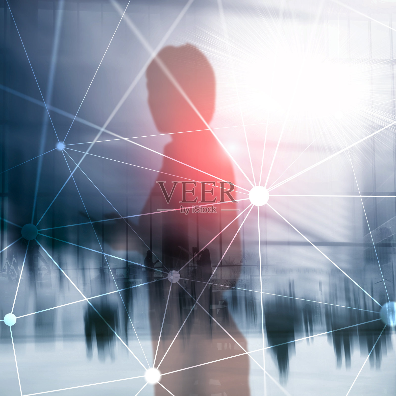 在模糊的摩天大楼背景上使用区块链网络。金融技术与通讯概念。照片摄影图片