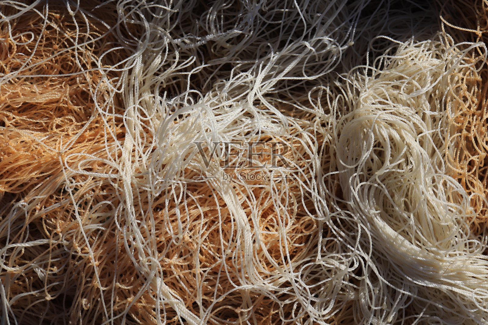 皱巴巴的鱼网。航海海洋背景。照片摄影图片