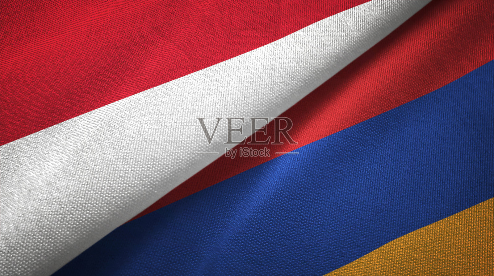 亚美尼亚和印度尼西亚的两面旗子交织在一起,织物织物质地照片摄影图片