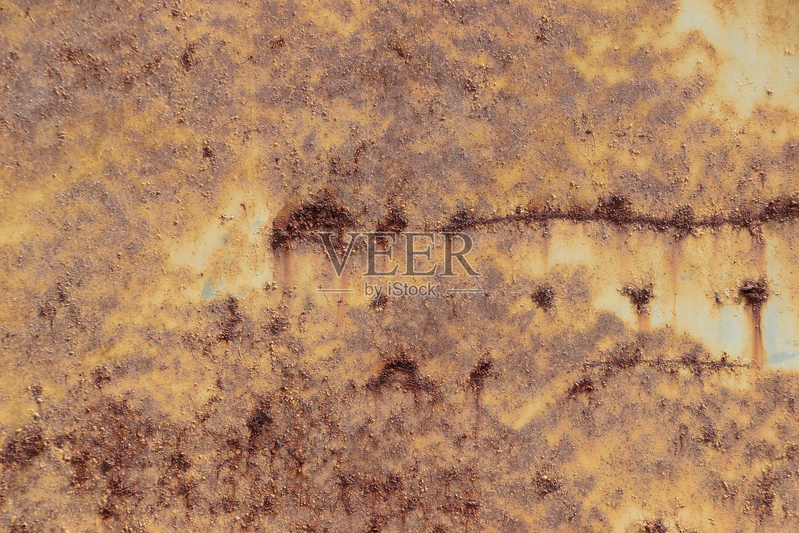 锈蚀钢板的纹理背景。生锈的金属墙。照片摄影图片