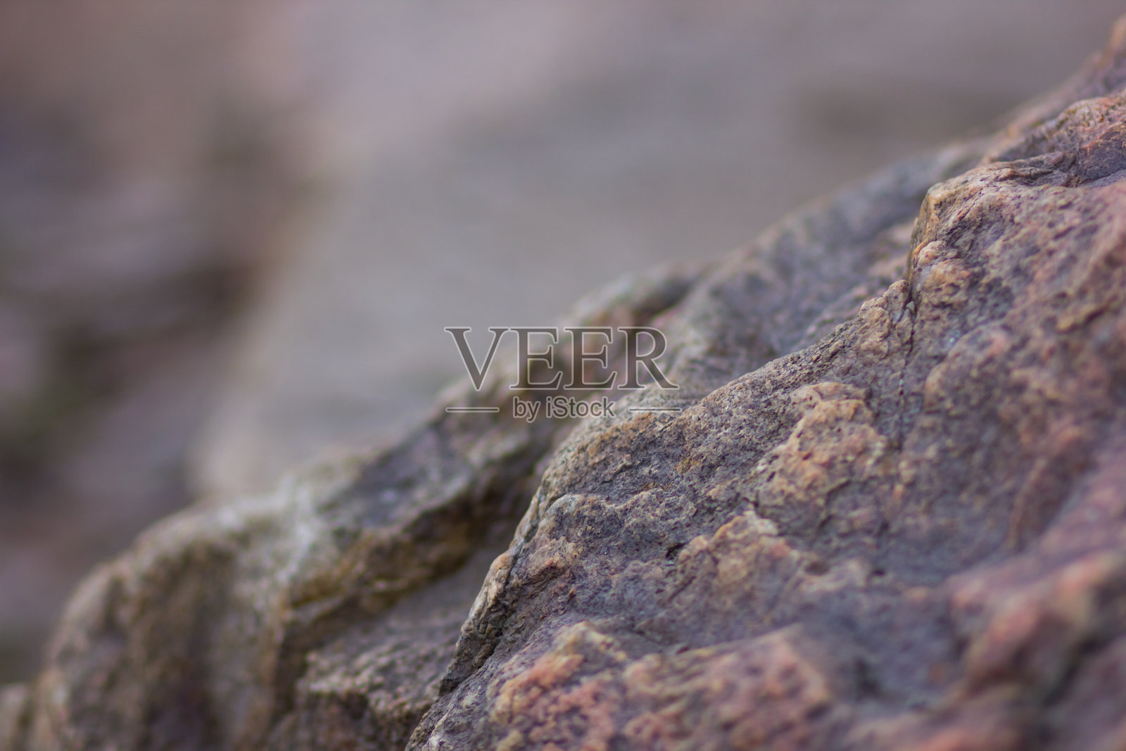 背景模糊的花岗岩。花岗岩关系密切。石头的纹理。天然材料背景照片摄影图片